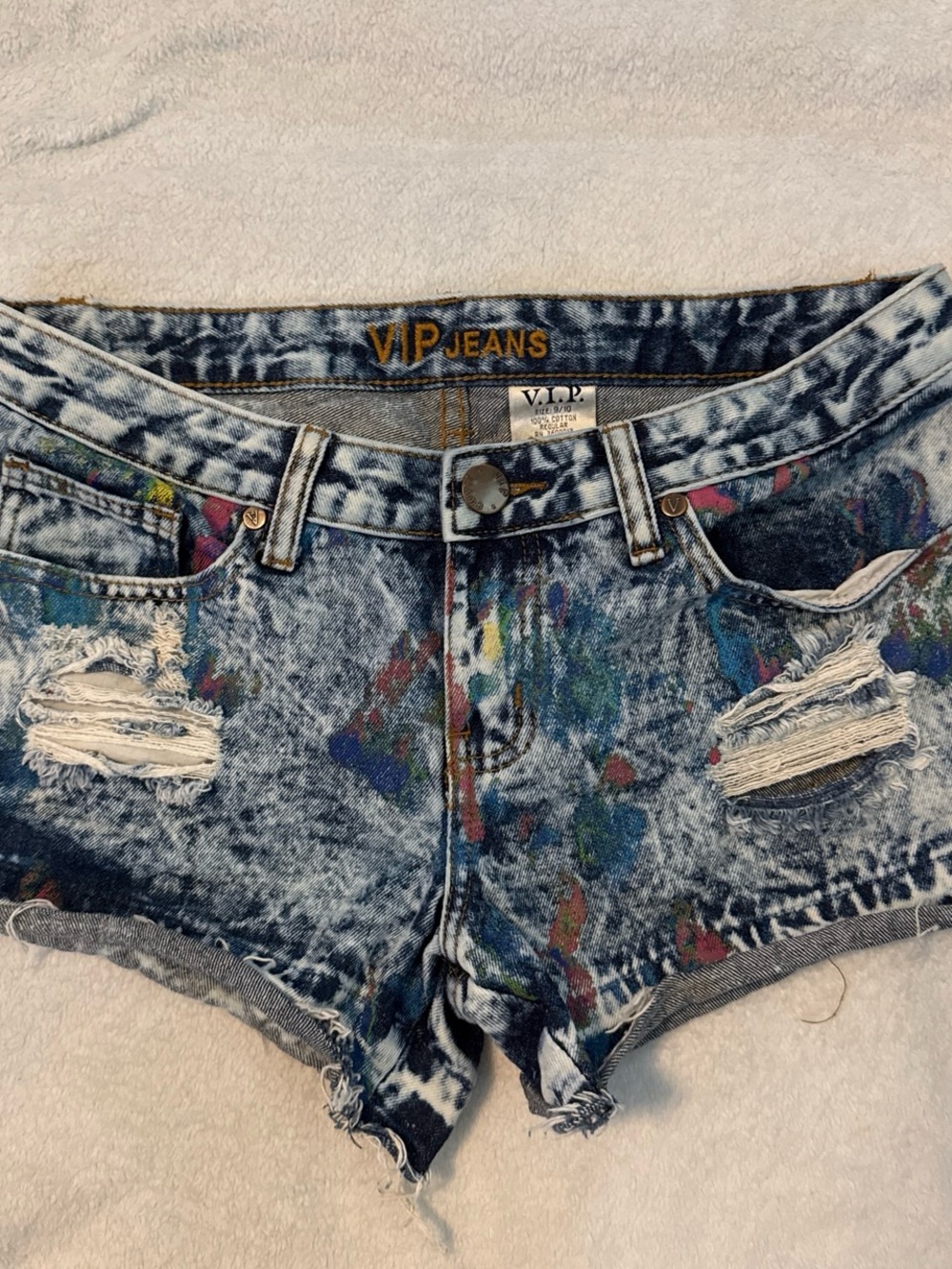 VIP Women's Acid-Wash Jean Shorts with Multicolor Paint Splatter